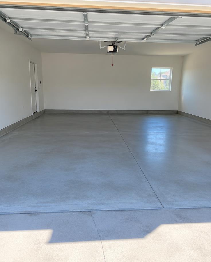Same garage empty and spotless after the cleanout